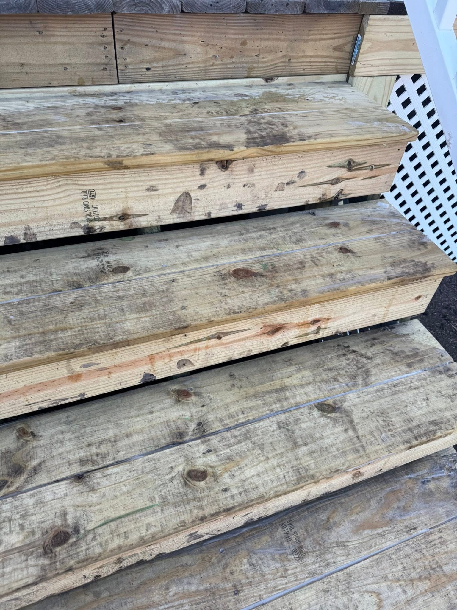 The same exterior wood steps after cleaning